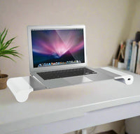 Laptop on a white stand with a white background