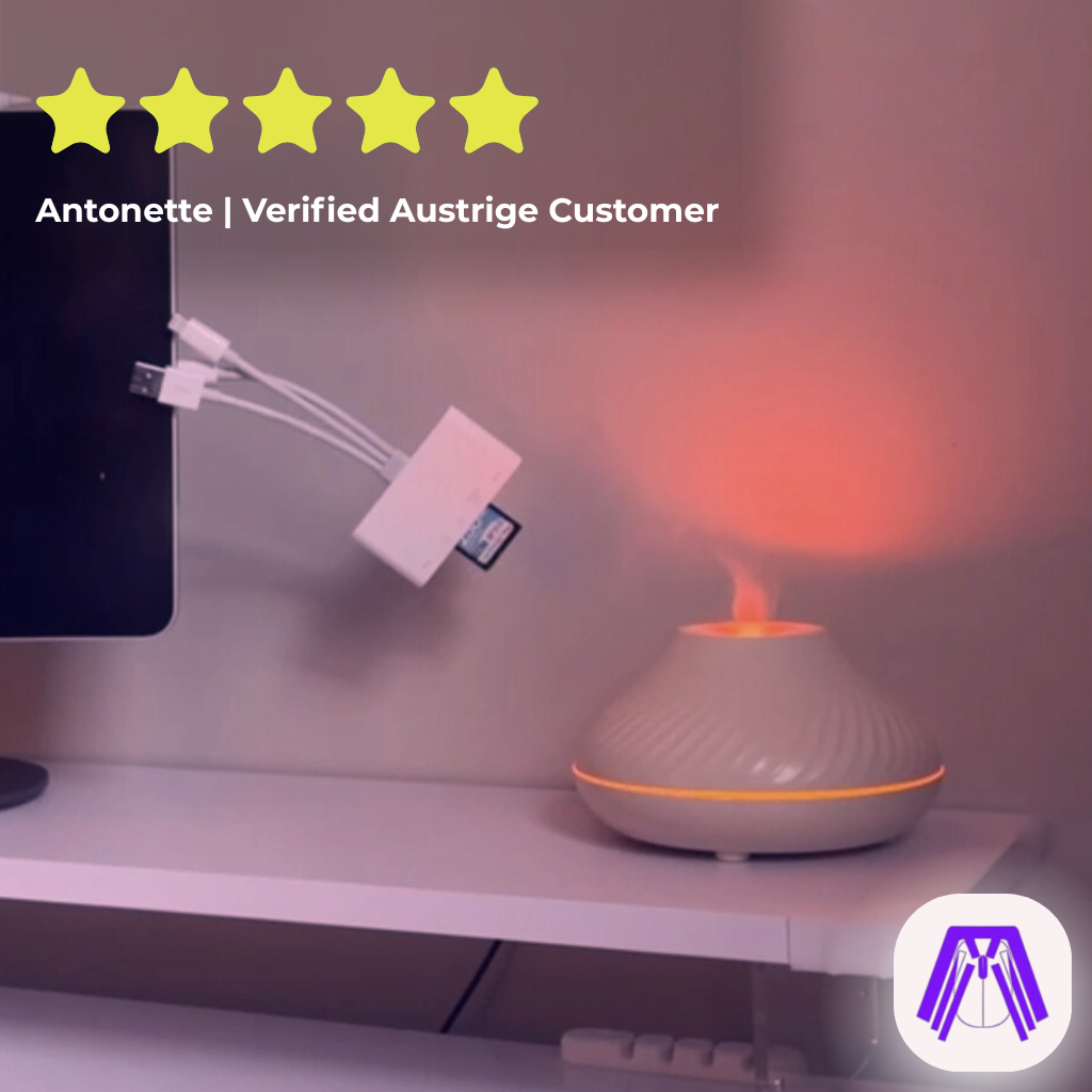 Aromatherapy diffuser on a desk with a five-star rating and customer name displayed.