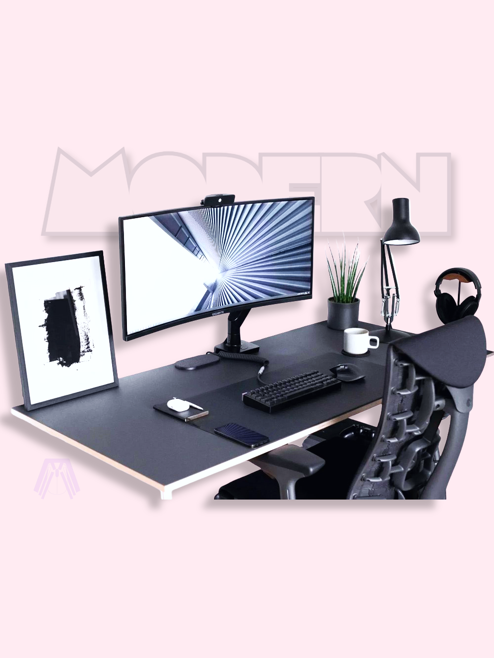 Modern office setup with a desk, computer monitors, keyboard, mouse, and chair.