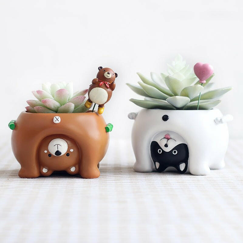 The Cartoon Animal Flower Pots that is considered a Home decor