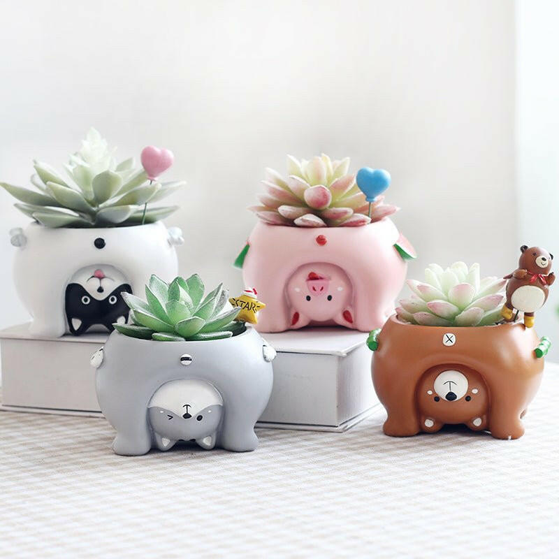 The Cartoon Animal Flower Pots that is considered a Home decor