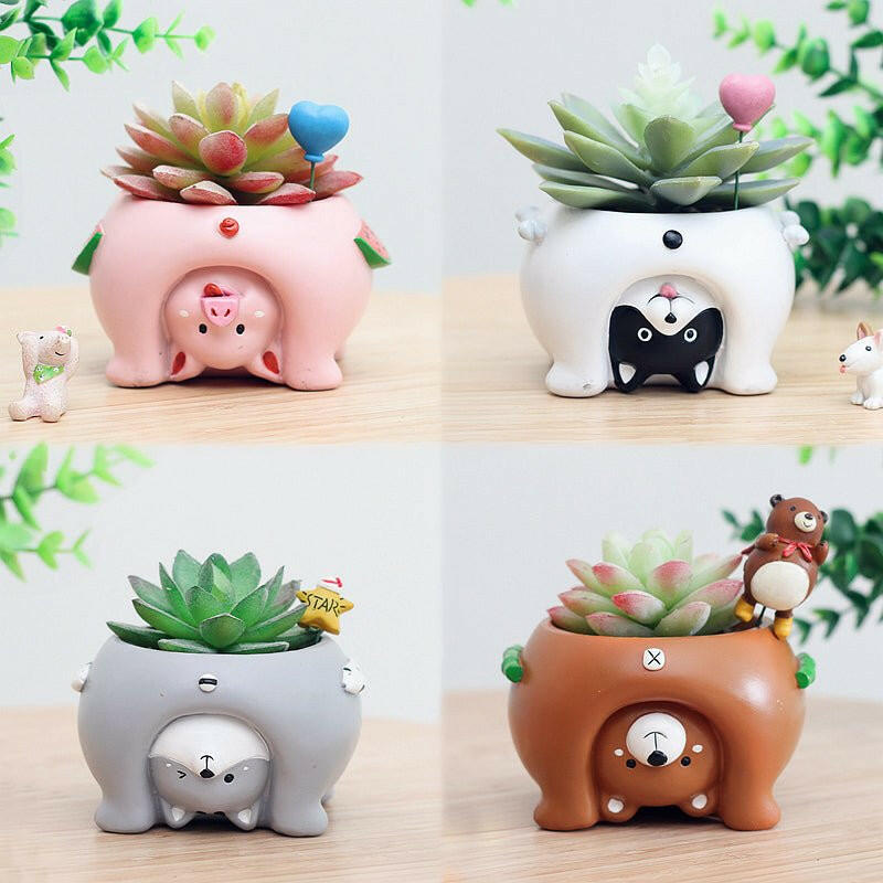 The Cartoon Animal Flower Pots that is considered a Home decor