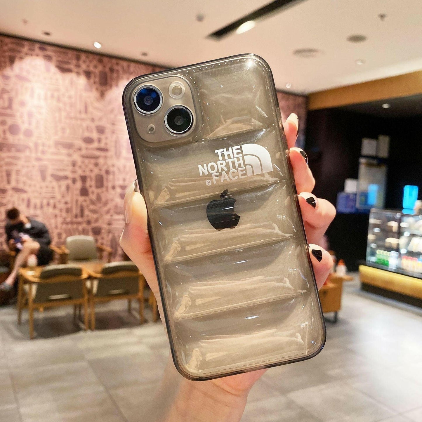 The Transparent iPhone Case - NorthFace that is considered a Phone cases